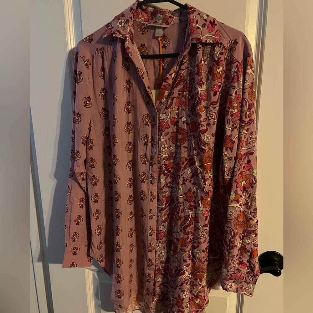 Woman’s button down pink floral shirt
